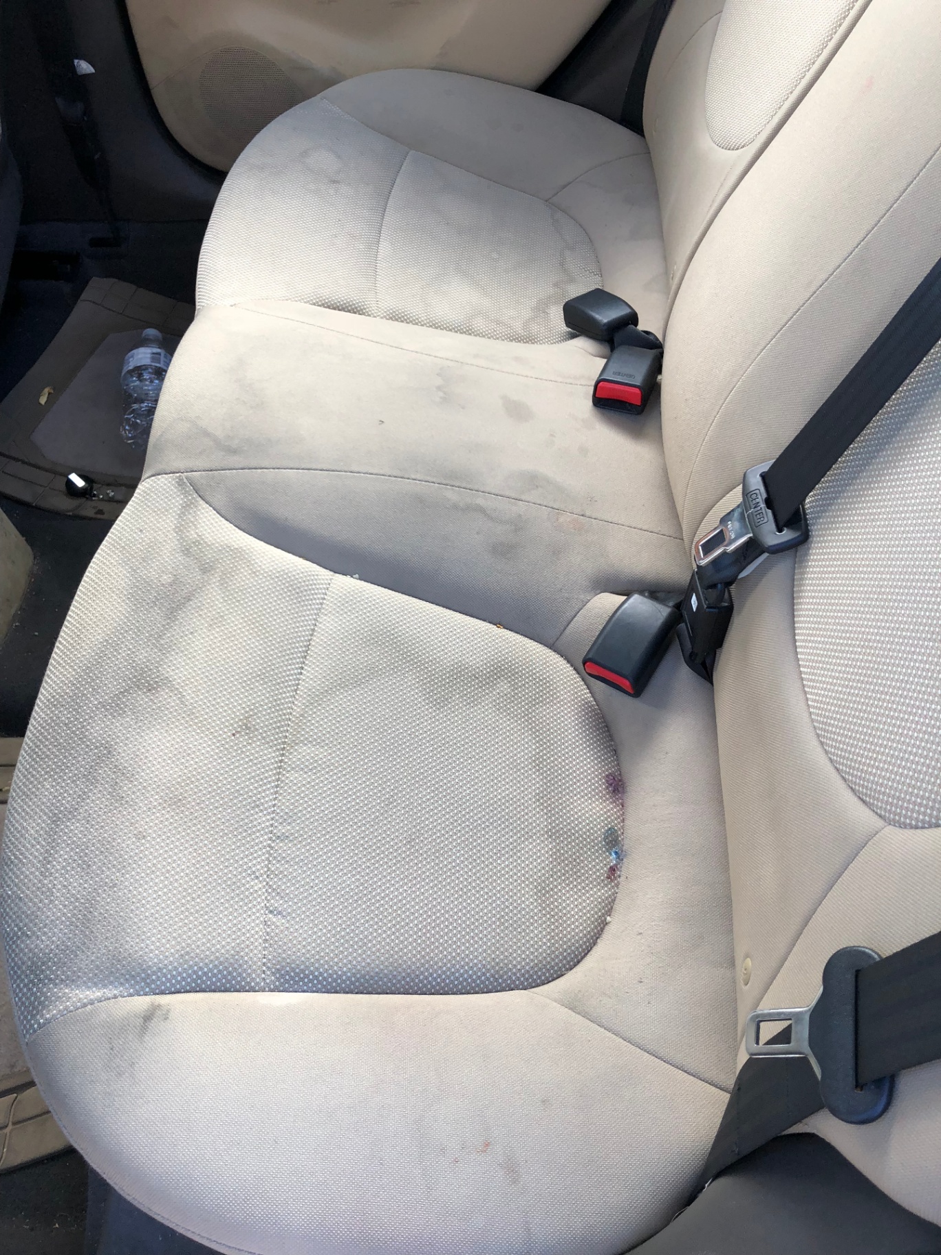 Interior Shampoo (Rear Seat) — Before