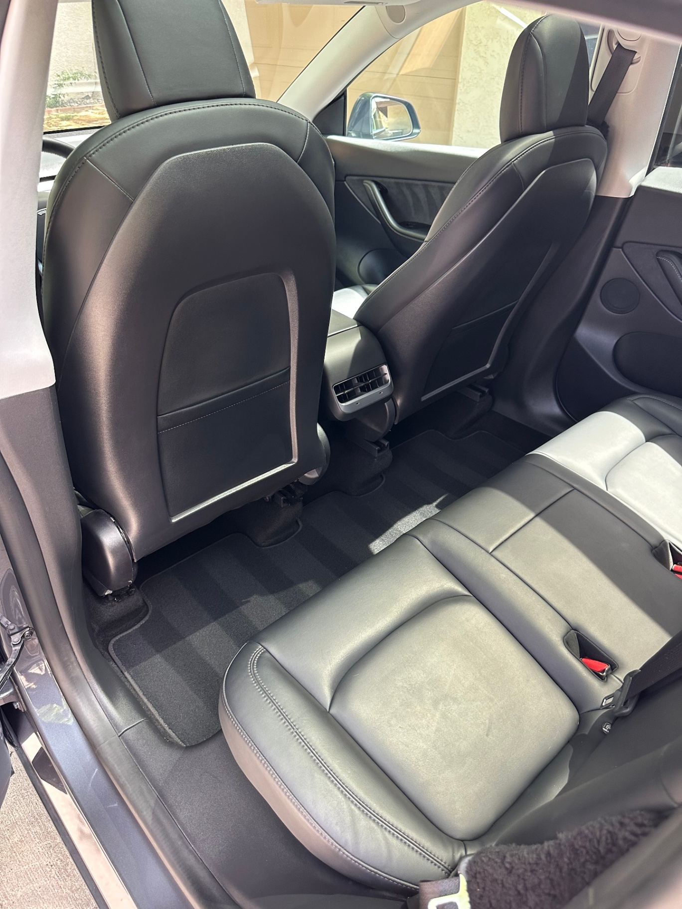 Tesla Interior — Rear Seats Detail — Interior detailing result in Las Vegas